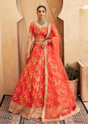 Aarohi latest trending luxury mehndi & formal lehenga in Orange with crystals, sequins, pearls, and zardozi by Waqas Shah Lahore Pakistan