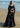 Black luxury formal lehenga choli by designer Waqas Shah with elegant hand embroidery.
