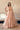 Coral Bliss coral peach formal lehenga choli photographed full length indoors, Pakistani designer wear