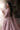 Embellished back of the Diyar blush pink bridal choli with beaded tassel hem by Waqas Shah Official