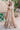 Golden Patel golden Pakistani bridal lehenga choli, full front view with high-neck embellished choli and flared sequin lehenga with zardozi waist belt