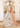 Gul Bano designer white Pakistani lehenga choli with floral resham work by Waqas Shah Official
