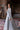 Luxury designer wedding dress in Misty Blue with crystal embellishments and handcrafted detailing