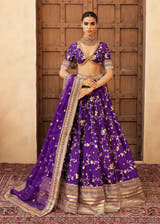Mahrang latest trending luxury mehndi & formal lehenga in Purple with tear drop hand embellished mirror work, pearls, dabka, and crystals by Waqas Shah Lahore Pakistan