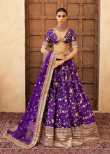 Mahrang latest trending luxury mehndi & formal lehenga in Purple with tear drop hand embellished mirror work, pearls, dabka, and crystals by Waqas Shah Lahore Pakistan