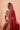 Mastani red bridal lehenga with the organza dupatta over the head, Pakistani barat look
