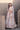 Mystic Rose white formal lehenga choli portrait with the embellished dupatta over the shoulder