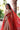 Traditional Red bridal couture Pakistan featuring intricate handcrafted embroidery by Waqas Shah