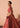 Designer red bridal lehenga choli side view by Waqas Shah