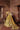 Back of Resham yellow choli with hand-embellished back neckline and long dupatta trail
