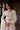 White Beige Pakistani reception dress with handcrafted bridal embroidery by Waqas Shah