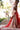 Zarafshan bridal lehenga with the full red dupatta train spread out by Waqas Shah Official