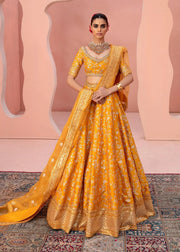 Zari latest trending mustard yellow mehndi wedding haute couture embellished bridal lehenga with mirror work by Waqas Shah Lahore Pakistan