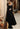Black designer lehenga choli featuring intricate 3D embellishment and handcrafted detailing by Waqas Shah Official