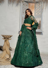 Green Pakistani Bridal Lehenga Choli with intricate hand embellishment by Waqas Shah Official