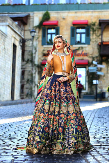 Mustard Gold and Blue Bridal Lehenga Choli with richly embellished Raw Silk by Waqas Shah Official