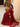Red net dupatta completing an embellished Pakistani designer dress by Waqas Shah Official