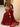 Red net dupatta completing an embellished Pakistani designer dress by Waqas Shah Official