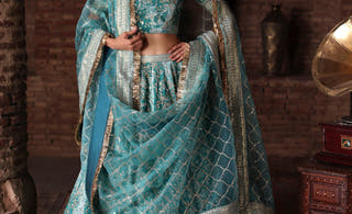 Manzil teal and turquoise velvet Pakistani bridal lehenga choli by Waqas Shah