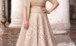 Made-to-measure Pakistani bridal lehenga choli cut to the bride's own measurements: Dilnashin in champagne gold by Waqas Shah