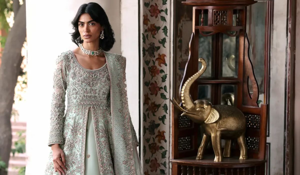 Laila Mint Green Pakistani Reception Gown with luxury hand embroidery by Waqas Shah Official, premium Wedding Couture Pakistan for Walima and bridal reception.