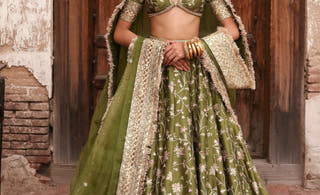 Mahira olive green Pakistani mehndi lehenga choli from the Shakuntala collection by Waqas Shah