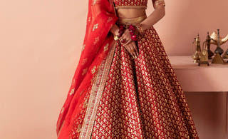 Mastani red Pakistani mehndi and barat lehenga choli by Waqas Shah