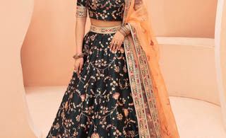 Shah Bano dark green mirror work mehndi lehenga choli with peach dupatta by Waqas Shah