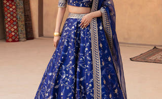 Shahnaaz midnight blue Pakistani mehndi lehenga choli by Waqas Shah