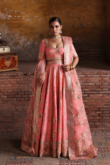 Avnoor salmon pink Pakistani bridal lehenga choli in Korean raw silk with aari tilla work, full front view
