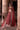 Full-length view of Bazaar Pakistani velvet lehenga with metallic floral embroidery and wide embellished hem