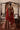 Back view of the Simran red lehenga choli with the gold-bordered organza dupatta falling behind