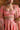 Avnoor salmon pink Pakistani choli close-up with neckline hand embellished in pearls, cut-dana and Swarovski crystals