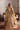 Saanvi skin gold lehenga with organza dupatta over the head, a nikkah bridal look