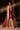 Full-length view of the Simran red lehenga choli in a Lahore haveli