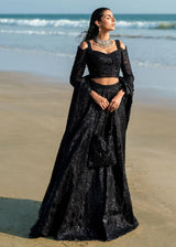 Black luxury formal lehenga choli by designer Waqas Shah with elegant hand embroidery.
