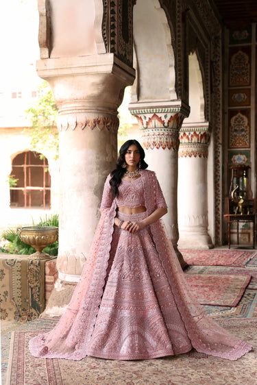 Blush Pink Bridal Lehenga Choli by Waqas Shah with luxury hand embroidery for Pakistani wedding couture


