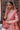Luxury blush pink Pakistani formal dress handcrafted in Lahore, Pakistan showcasing exceptional artisan craftsmanship and elegant tailoring.
