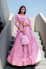 Crystal Blush blush pink Pakistani bridal lehenga choli, full front view with square-neck choli, sequin lehenga and a styling potli