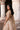 Close-up of hand embroidered Champagne Gold bridal wedding dress
