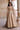 Front view of the Dilnashin champagne gold nikkah lehenga choli showing the chevron gold beadwork on the skirt