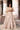 Full-length Dilnashin champagne gold nikkah lehenga with embellished dupatta over one shoulder, Pakistani bridal couture