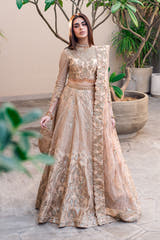 Golden Patel golden Pakistani bridal lehenga choli, full front view with high-neck embellished choli and flared sequin lehenga with zardozi waist belt