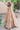 Full-length Golden Patel golden lehenga choli with sheer net dupatta and scalloped embellished border