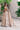 Golden Patel dupatta with scalloped hand-embellished border over the golden lehenga