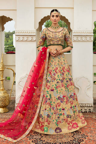 Husna Bano gold Pakistani mehndi lehenga with shocking pink dupatta – Waqas Shah Official