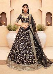Lakshmi latest trending luxury mehndi & formal lehenga in Black with thread & tilla floral and fauna motifs, crystals, pearls, and zardozi by Waqas Shah Lahore Pakistan