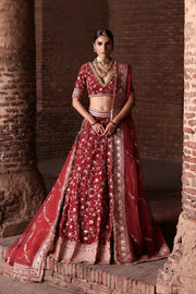 Bazaar luxury Light Burgundy Pakistani bridal lehenga by Waqas Shah Official crafted in Micro Velvet 9000 with intricate floral and vine embroidery.
