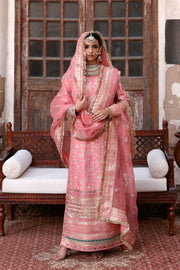 Chandni luxury blush pink Pakistani designer dress by Waqas Shah Official featuring a timeless straight-cut silhouette with intricate floral embroidery.
