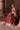 Embroidered Light Burgundy bridal choli featuring detailed neckline and sleeve embroidery by Waqas Shah Official.
